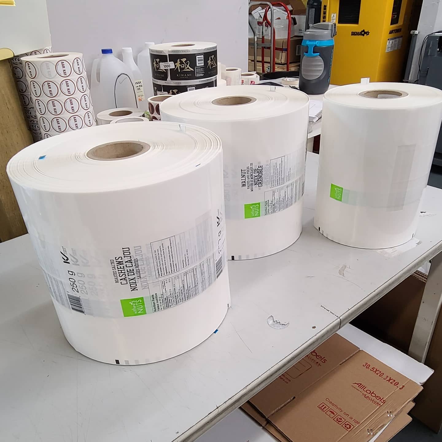 Rolls of custom food labels ready for packaging production